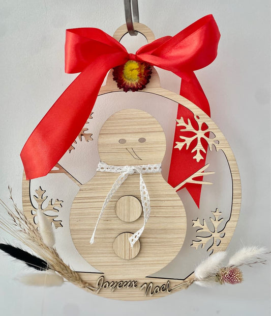 Déco boule bois découpée avec motifs de Noël